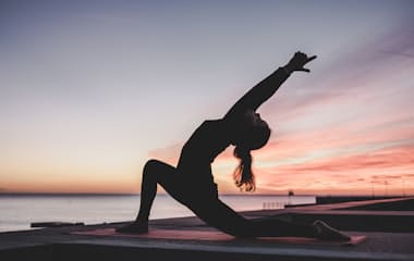 Person stretching outdoors